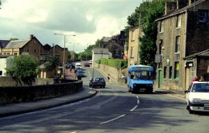 Image of a blue van driving on Road Junction in Barrowford, Lancashire