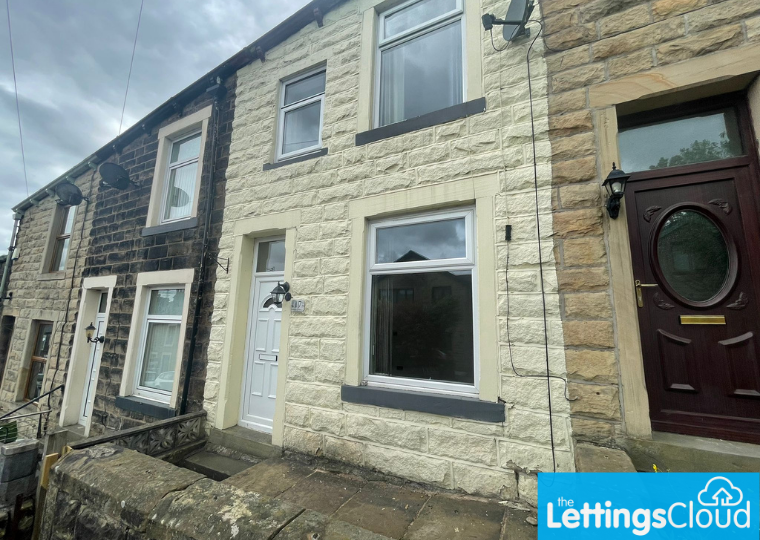 Outside of a two bedroom house on Bolton Grove, Barrowford available for rent with the lettings agents The Lettings Cloud