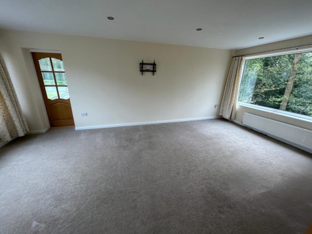 Living room of a 5 bedroom house located on Rogersfield, Langho, available for rent with The Lettings Cloud