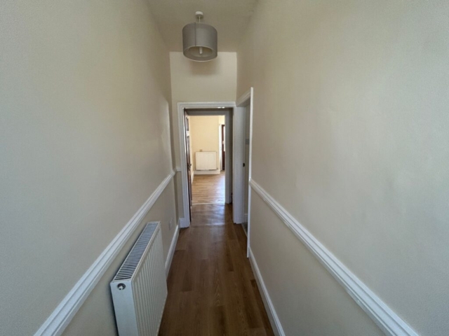 Hallway of a 2 bedroom terrace located on Queens Street, Whalley, Lancashire available for rent with The Lettings Cloud