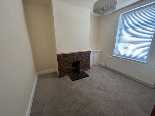 Front room of a 2 bedroom terrace located on Queens Street, Whalley, Lancashire available for rent with The Lettings Cloud
