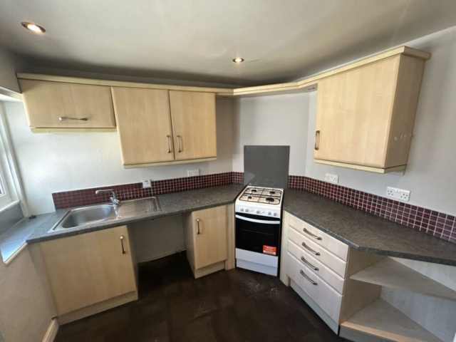 Kitchen of a 3 bedroom flat available for rent with The Lettings Cloud located on Burnley Road, Colne